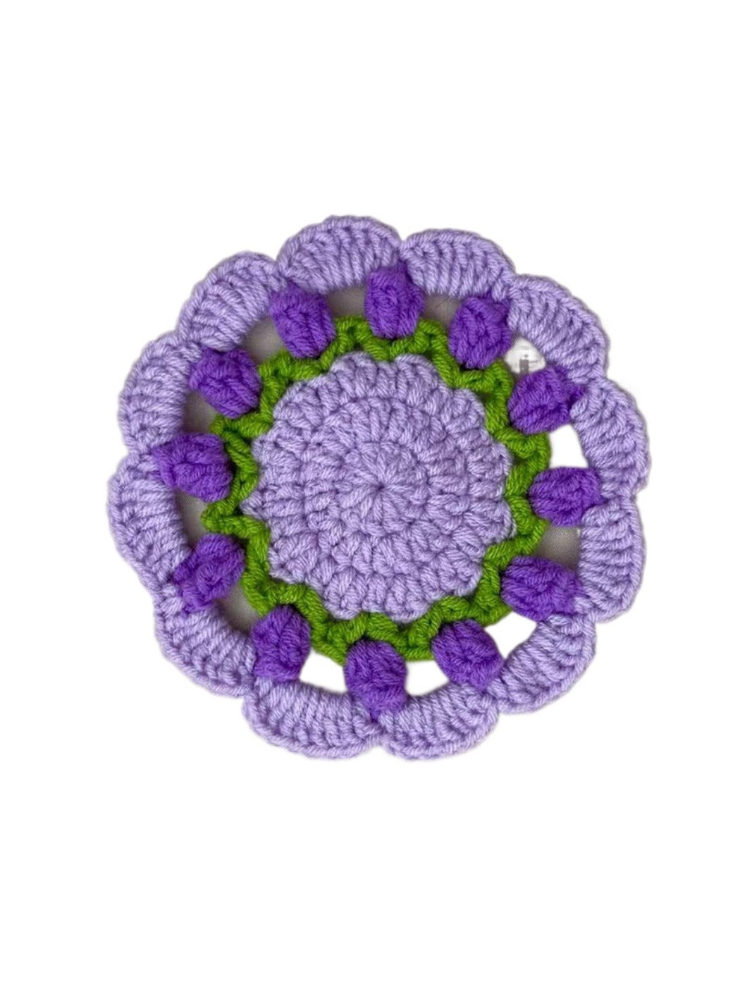 Crocheted sunflower coaster with a round brown center and yellow petals