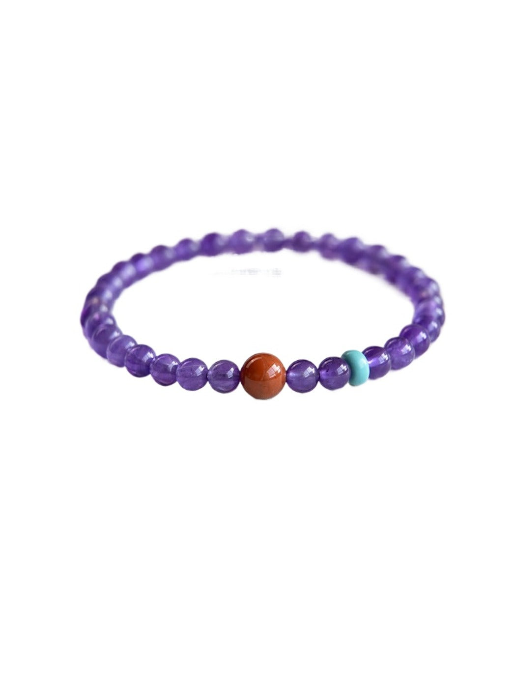 Emora lavender amethyst stone bracelet packaged as a gift with purple beads visible