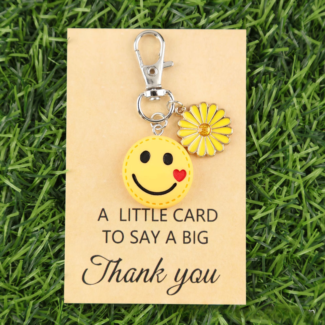Taphug Smiley Daisy Thank You Pocket Hug card displayed on a wooden surface