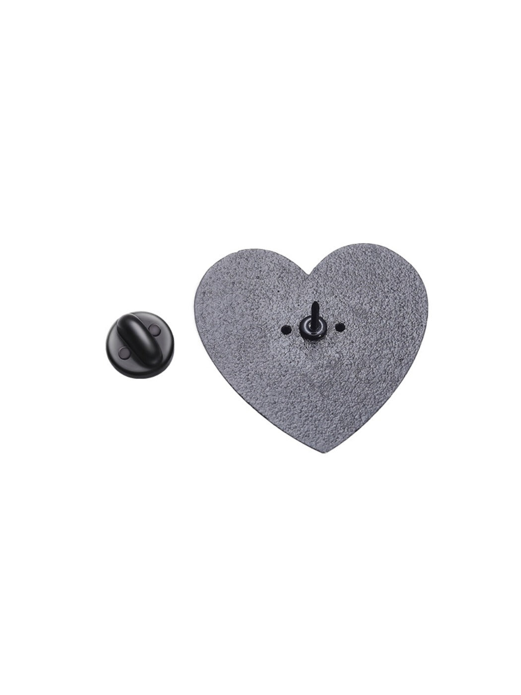 Pinori love heart pin attached to a denim jacket pocket
