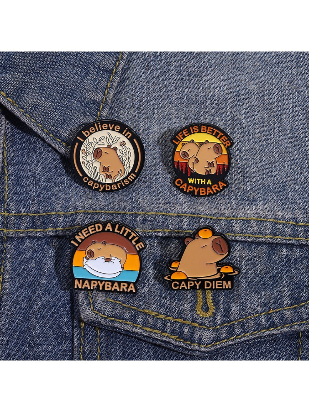 Pinori capybara enamel pin attached to a backpack strap