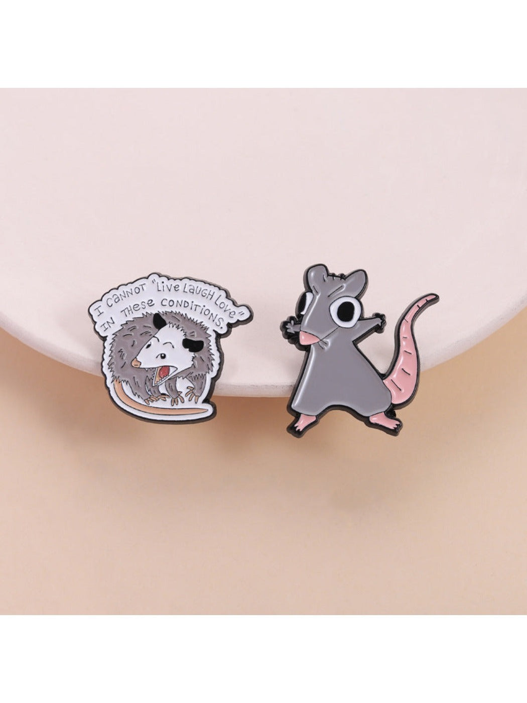 Pinori Fun Possum lapel pin showing a stylized possum design on a white background