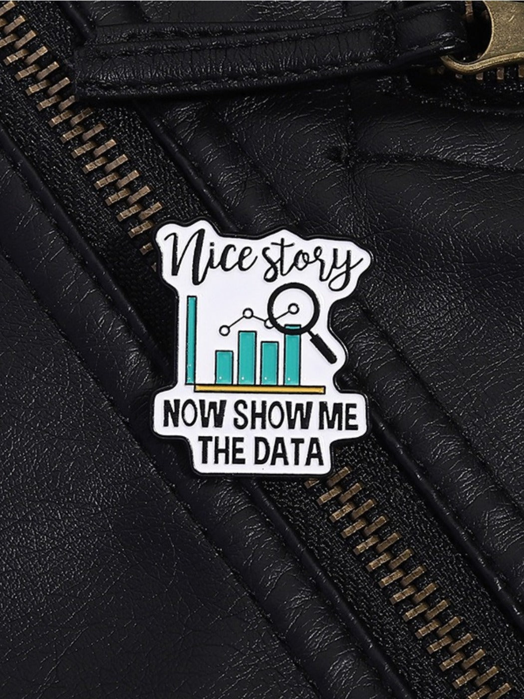 Pinori brooch worn on a jacket lapel demonstrating its size and style