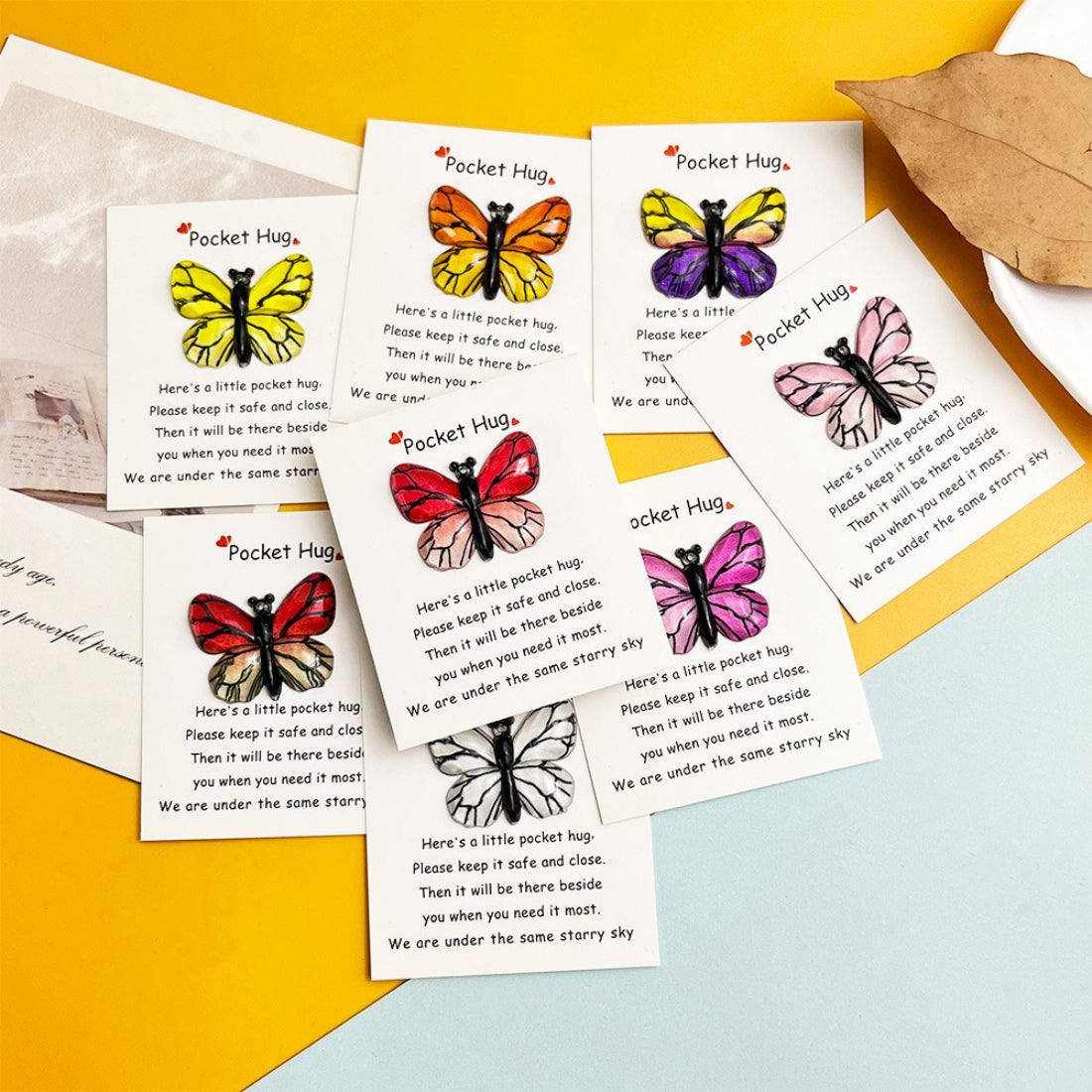 Taphug Rainbow Butterfly Pocket Hug plush toy with colorful butterfly wings