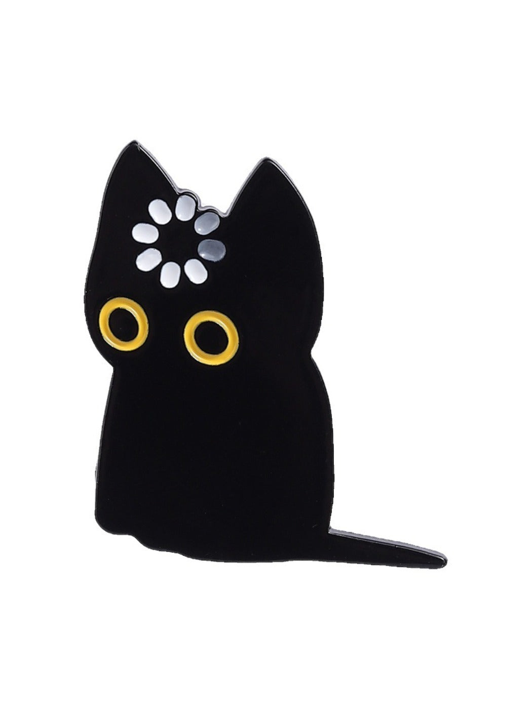 Pinori black cat brooch next to a ruler for size reference