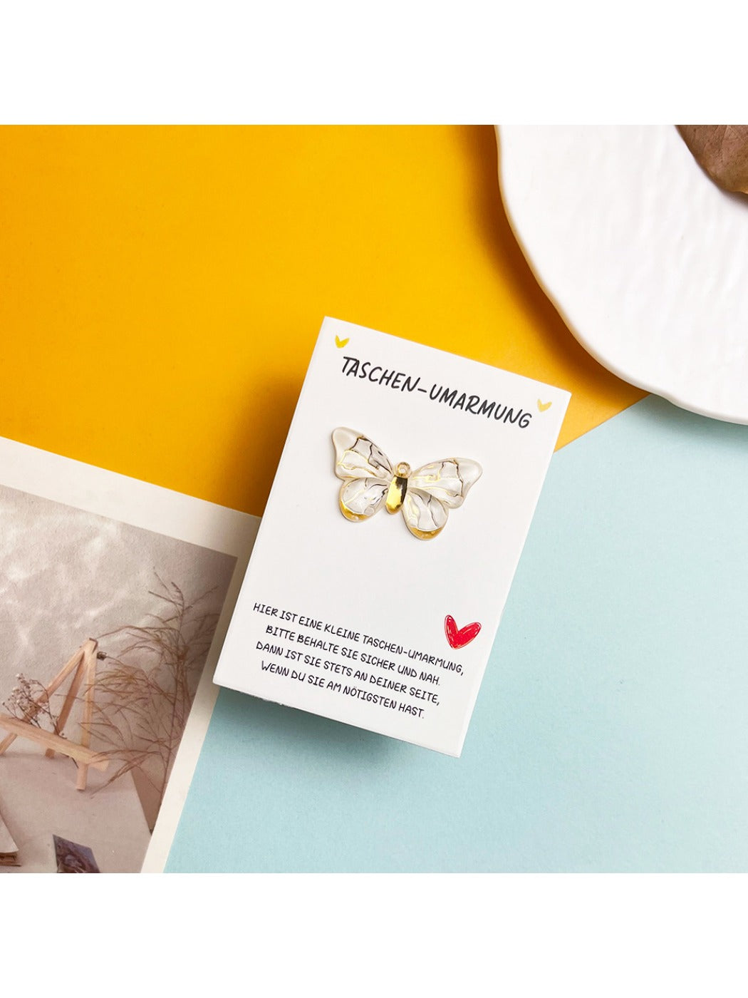 Taphug card unfolded displaying colorful gradient butterfly wings