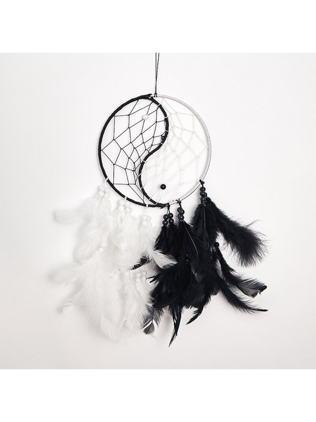 Close-up of vintage Tai Chi dreamcatcher wall art showing detailed ethnic motifs