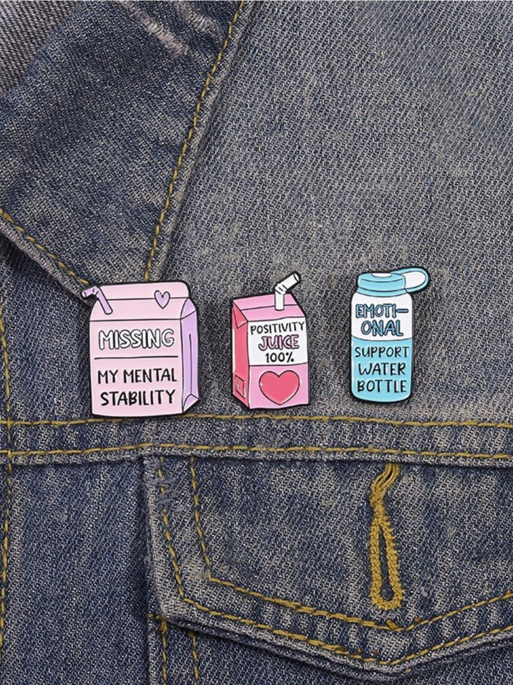 Back view of Pinori juice bottle brooch showing metal pin and fastening mechanism