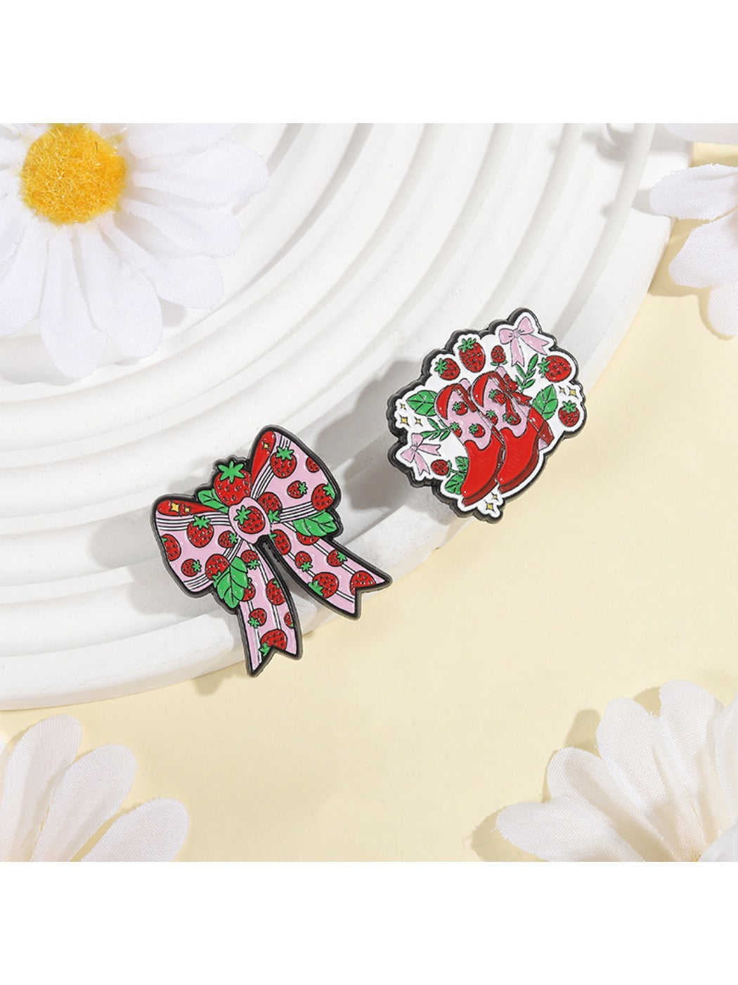 Strawberry brooch pinned on denim jacket showing cute kawaii design