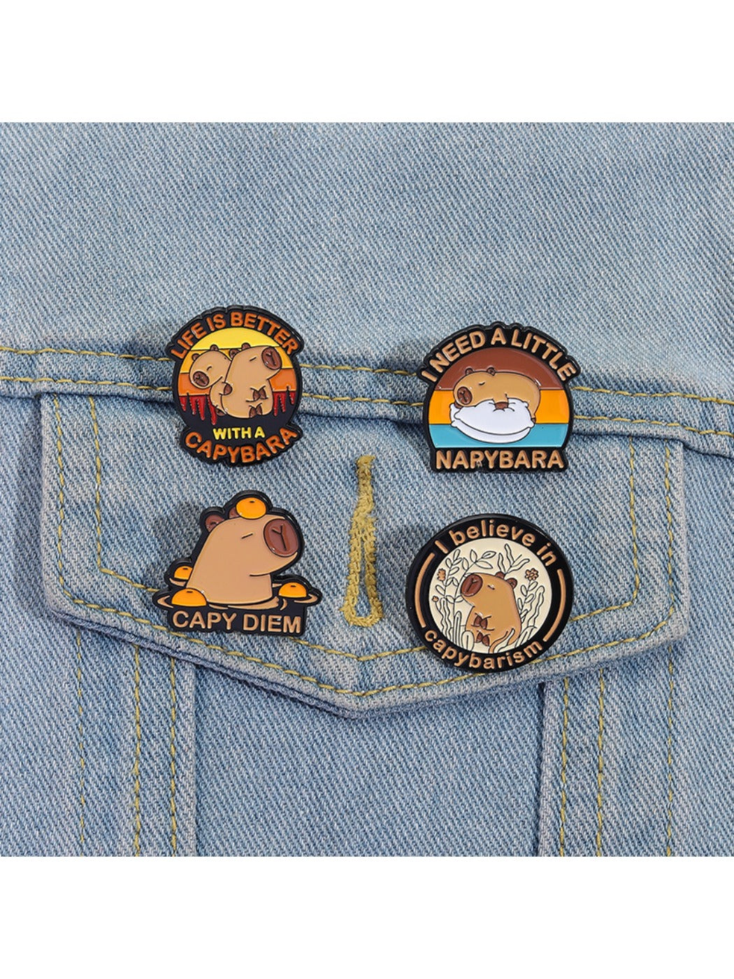 Side angle of Pinori capybara metal enamel pin showing thickness and clasp