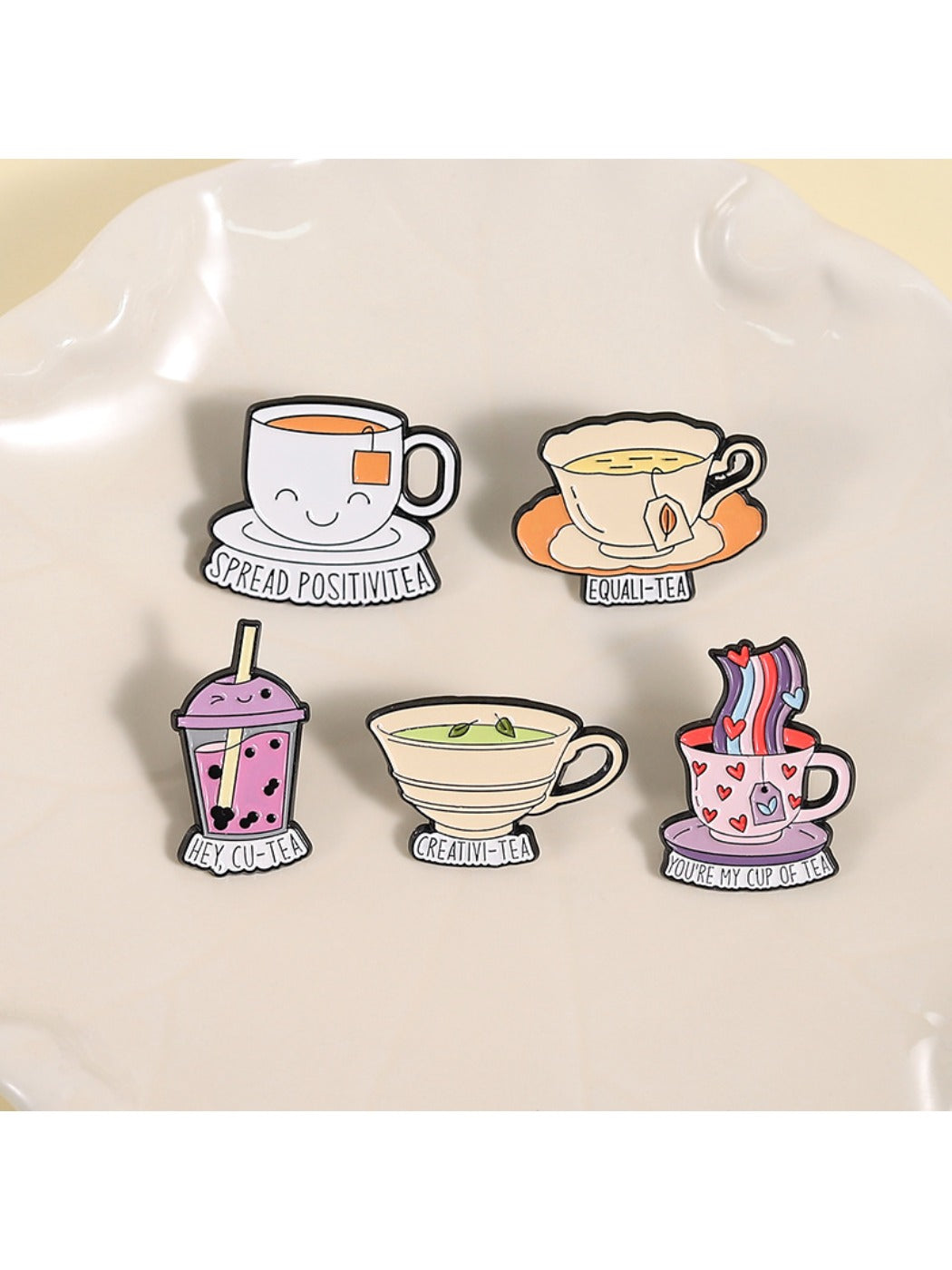 Pinori funny tea cup pun enamel pin with smiling tea cup design