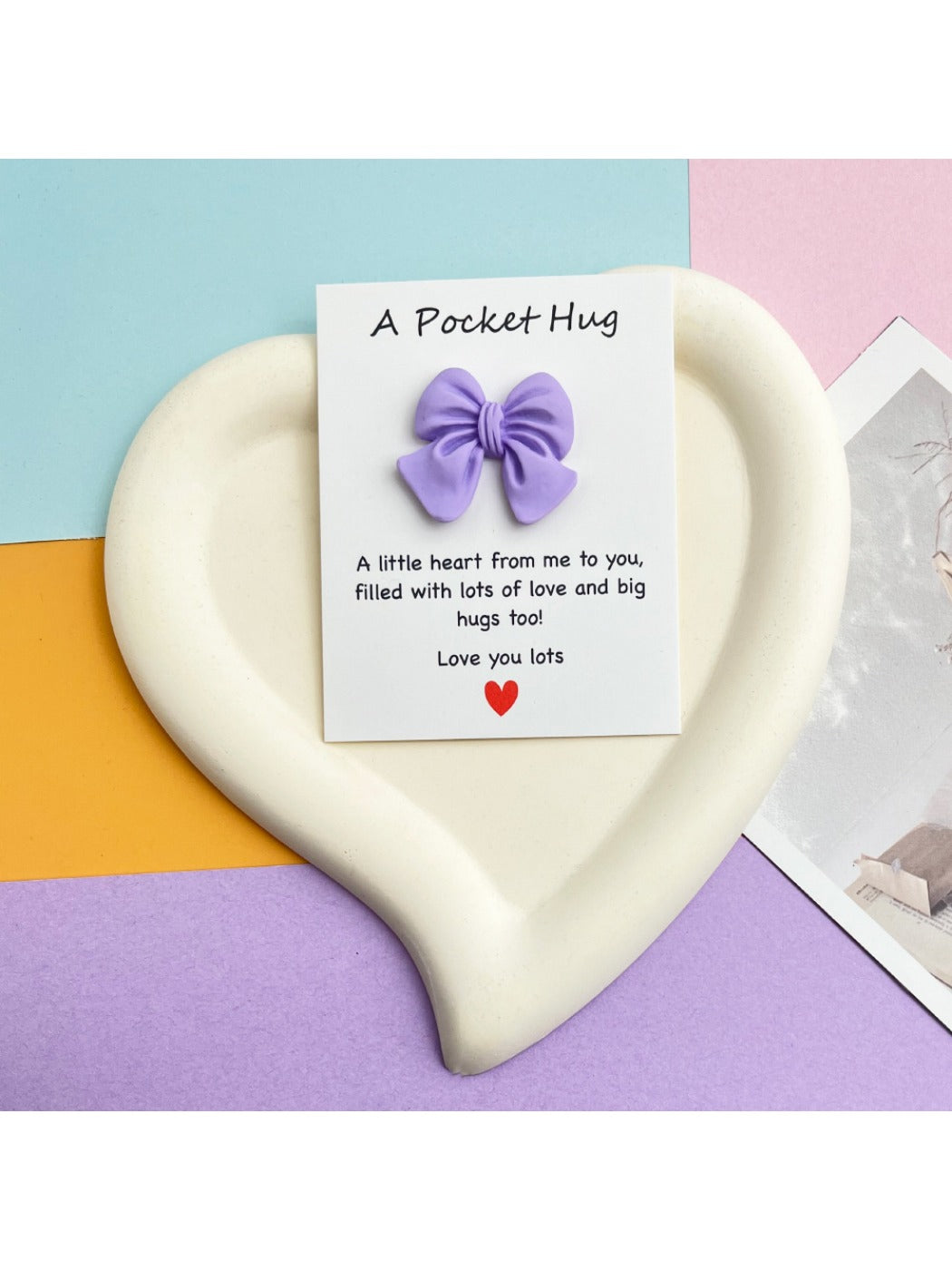 Taphug Pocket Hug card featuring a cute bow on the front cover