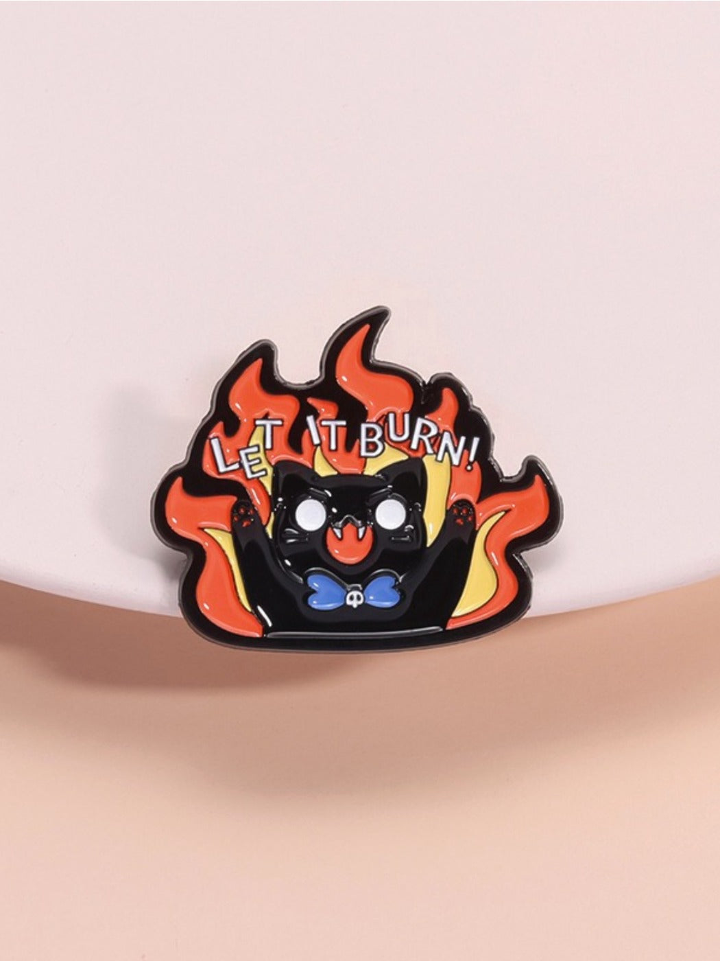 Pinori Evil Kitten brooch with detailed fiery flames enamel design