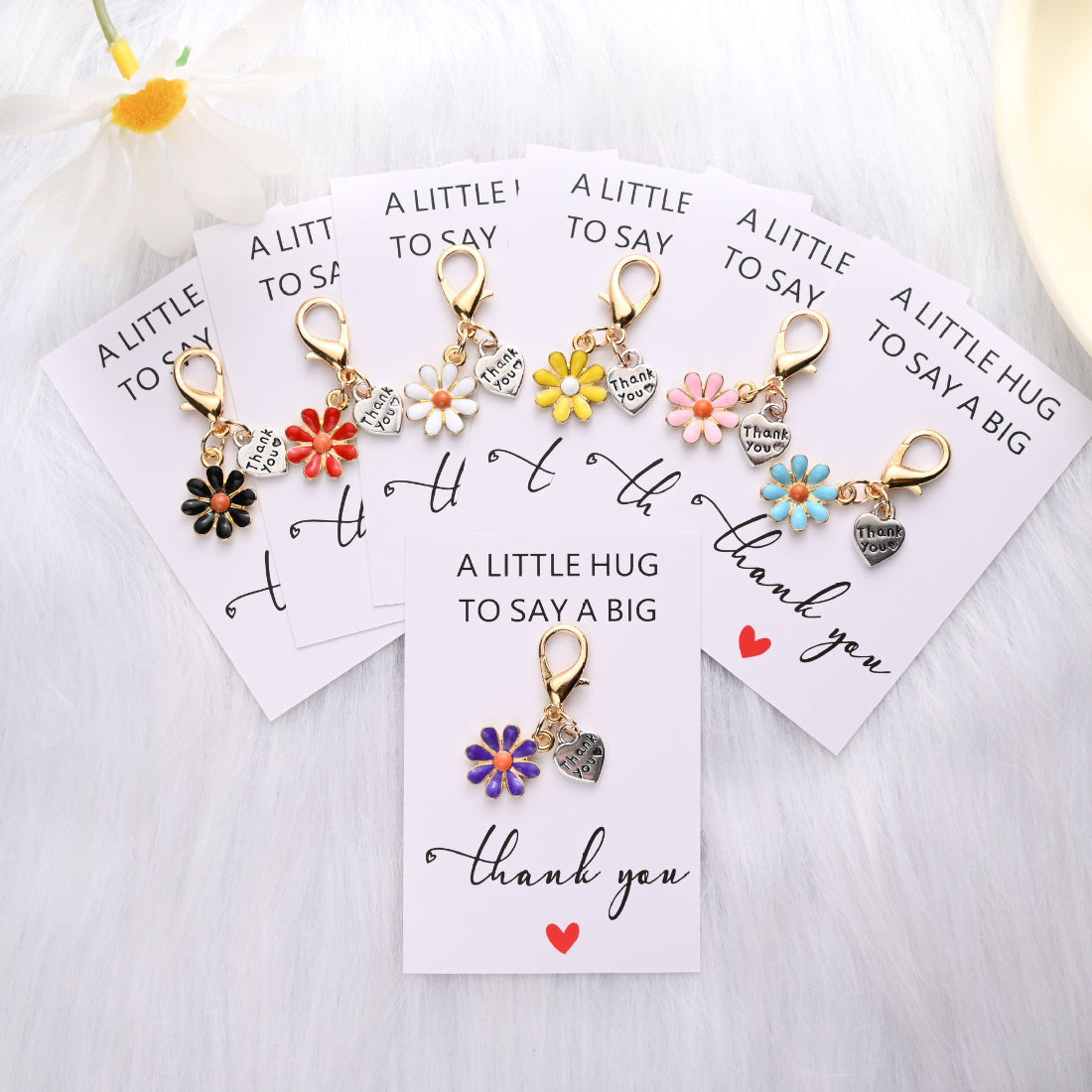 Taphug Pocket Hug card showing heart and daisy design on white background