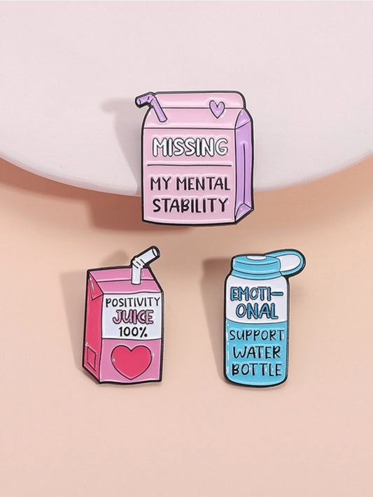 Pinori motivational juice bottle brooch on white background showing front design