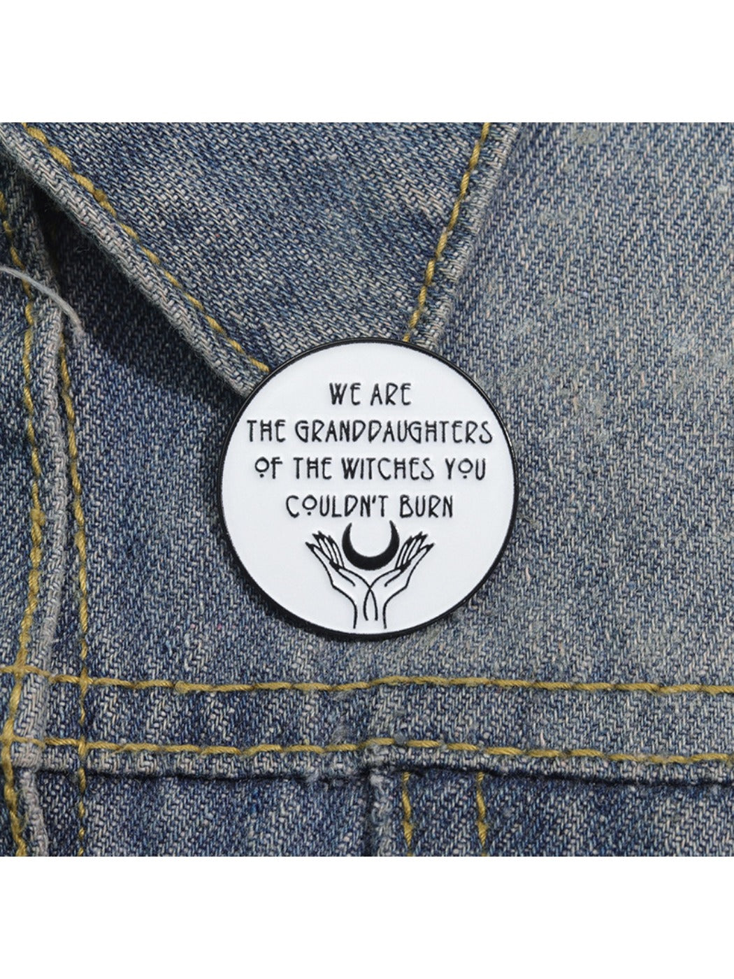 Side view of Girl Power Unburnable Badge Pin highlighting metal clasp
