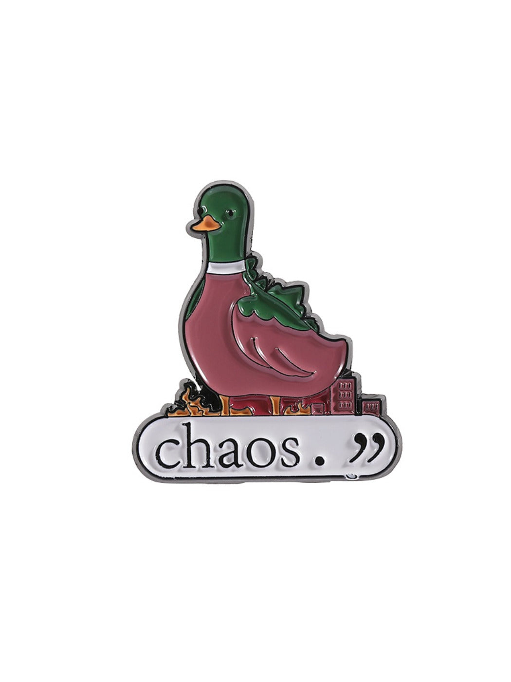 Pinori green duck brooch resting on a wooden table with natural light