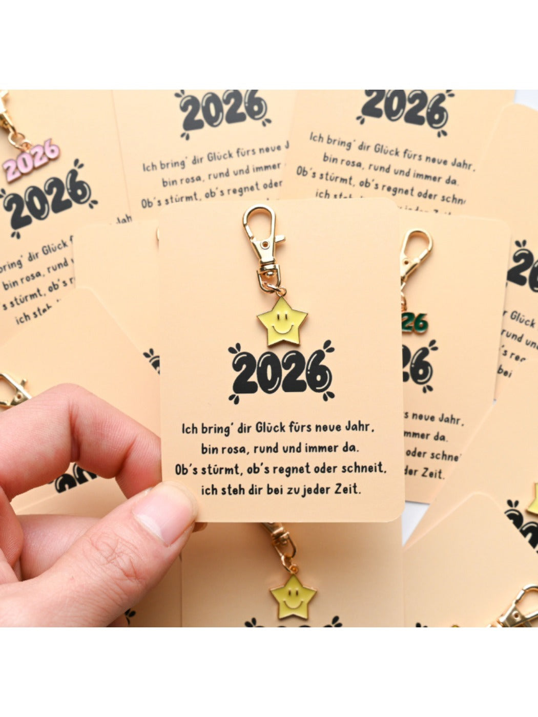 Flat lay of Taphug 2026 Blessing Card highlighting multicolor star and year 2026