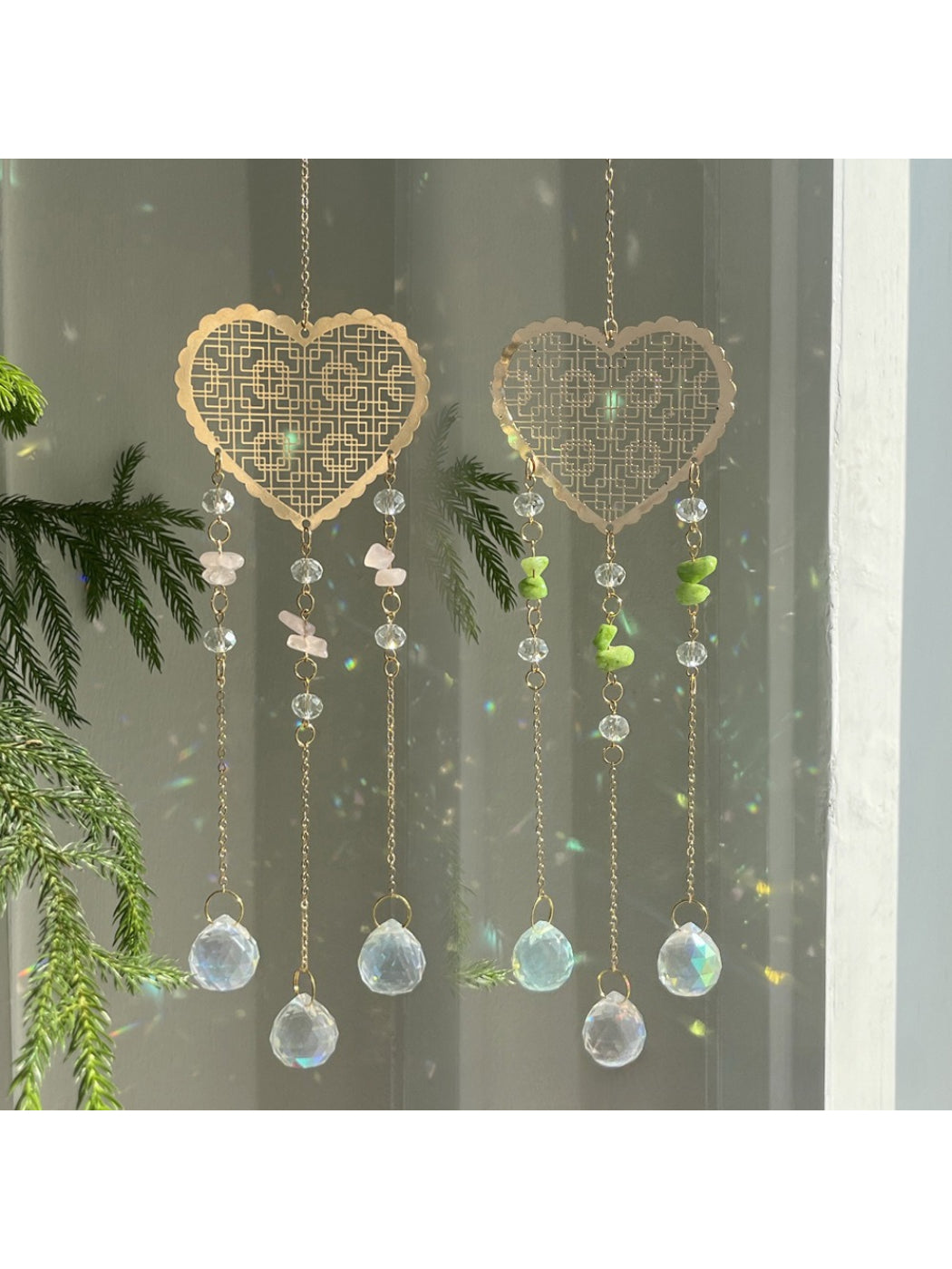 Somnia Heart Prism Hanging Sun Catcher with colorful heart-shaped prism on a string