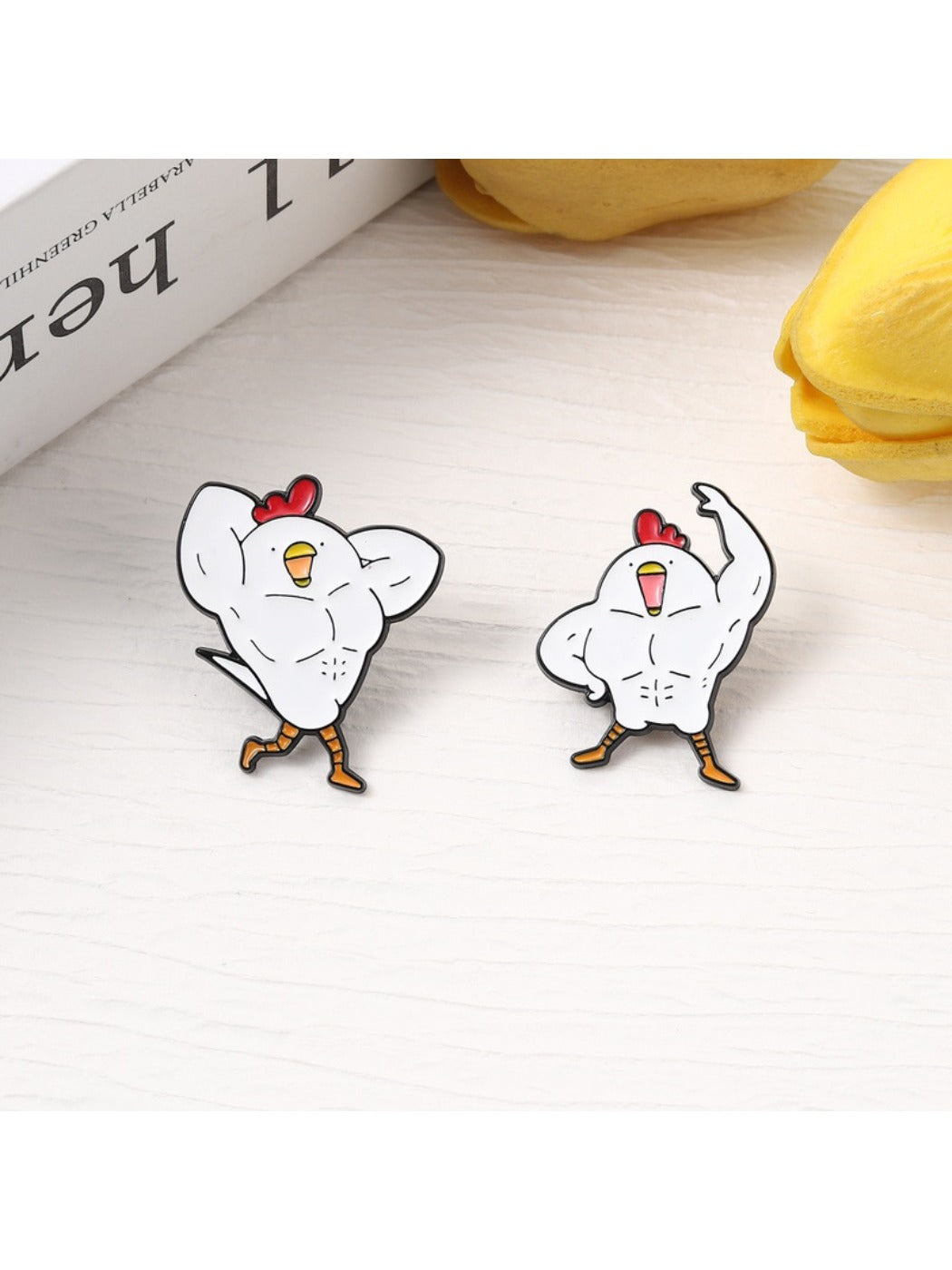 Side angle of Pinori chicken brooch highlighting its thickness and pin clasp