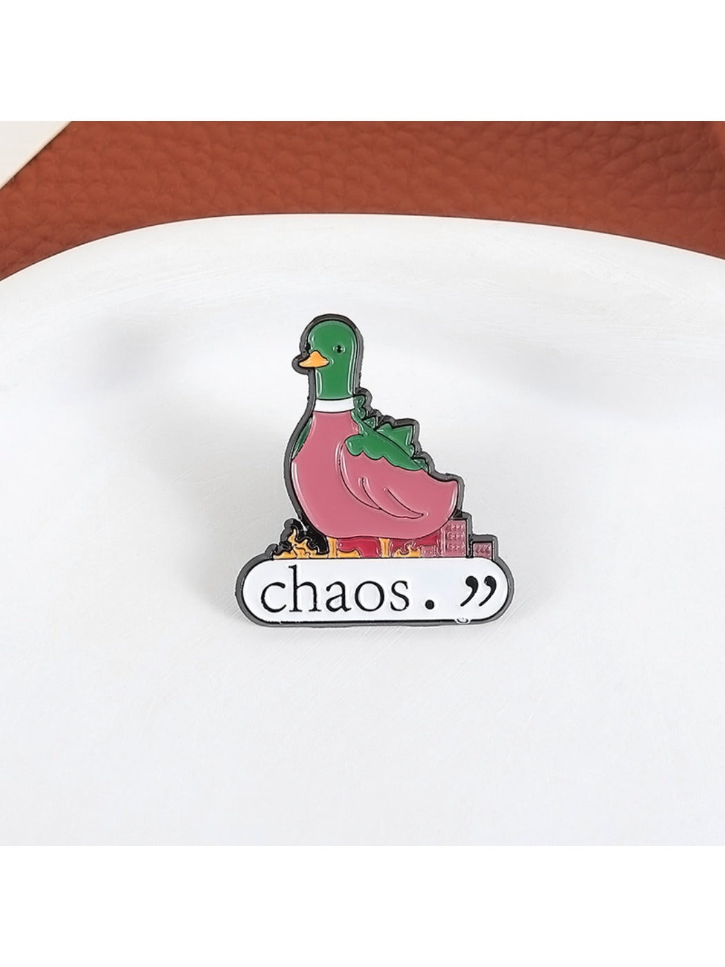 Pinori green duck brooch shown from side angle highlighting enamel details