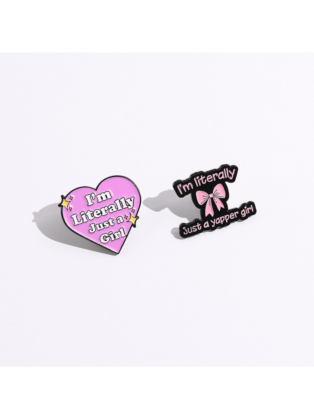 Close-up of Pinori elegant pink bow brooch with metal pin on white background