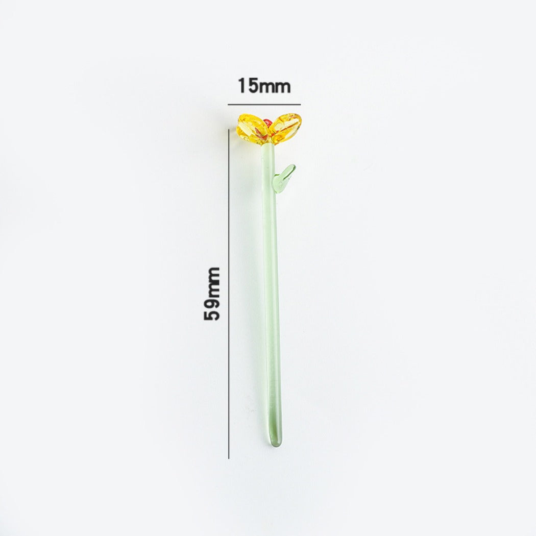 Multiple Thimara mini glass daisies arranged in a small cluster on a white background
