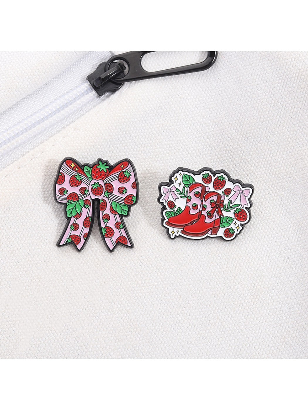 Back of the strawberry brooch showing metal pin clasp