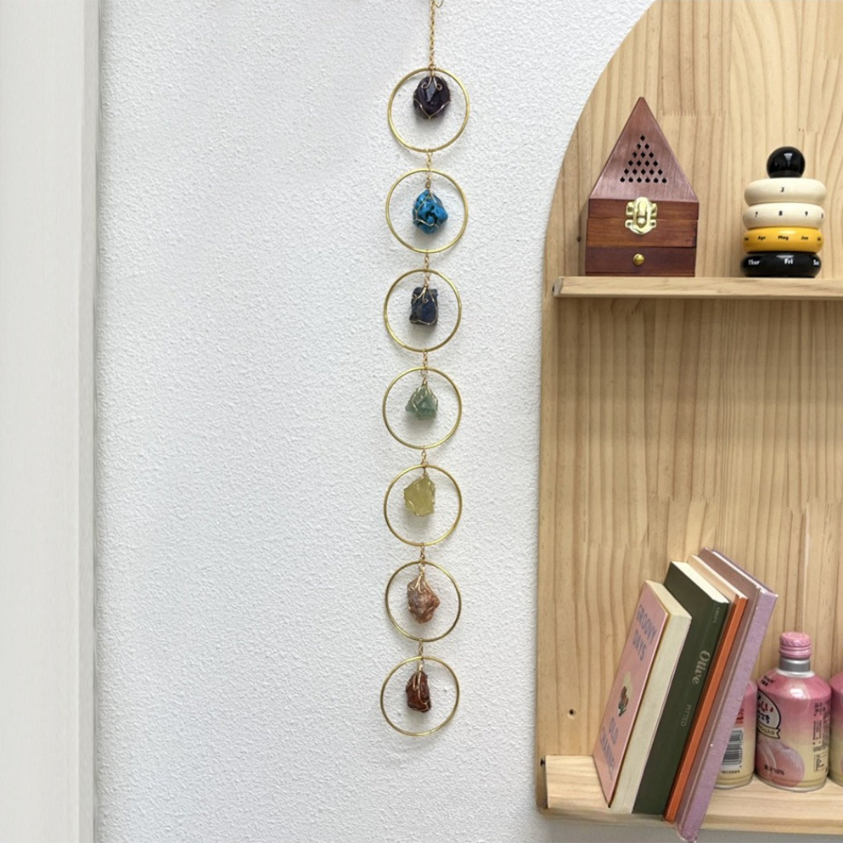 Somnira colorful stone ring hanging decor displayed against a plain background