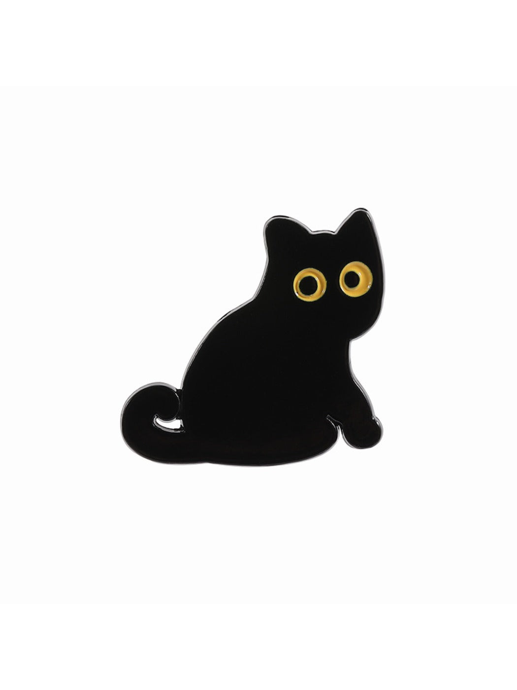 Pinori frog brooch with yellow eyes shown in natural lighting