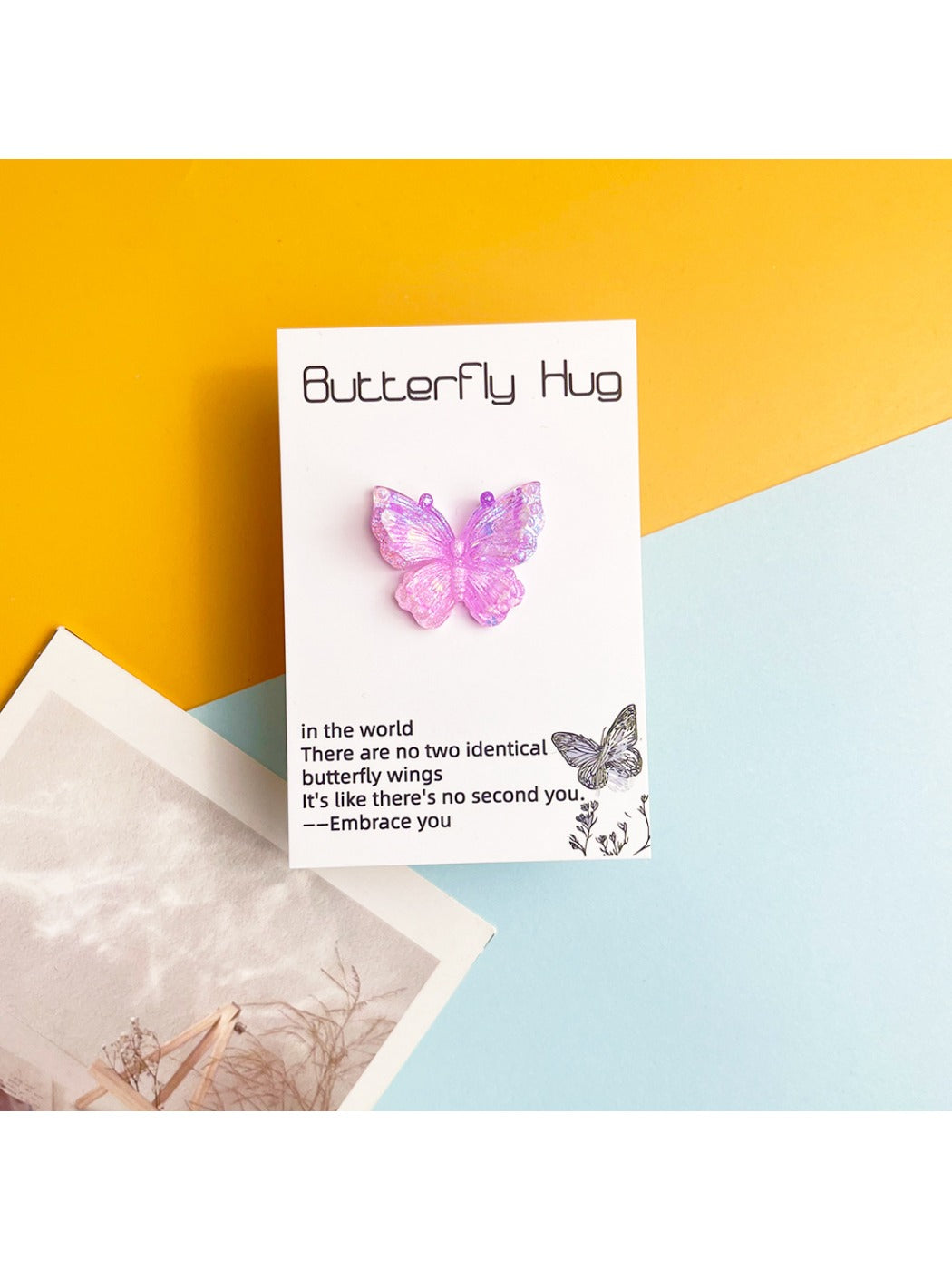Taphug Pocket Hug 2D Butterfly card held in hand showing size and shape
