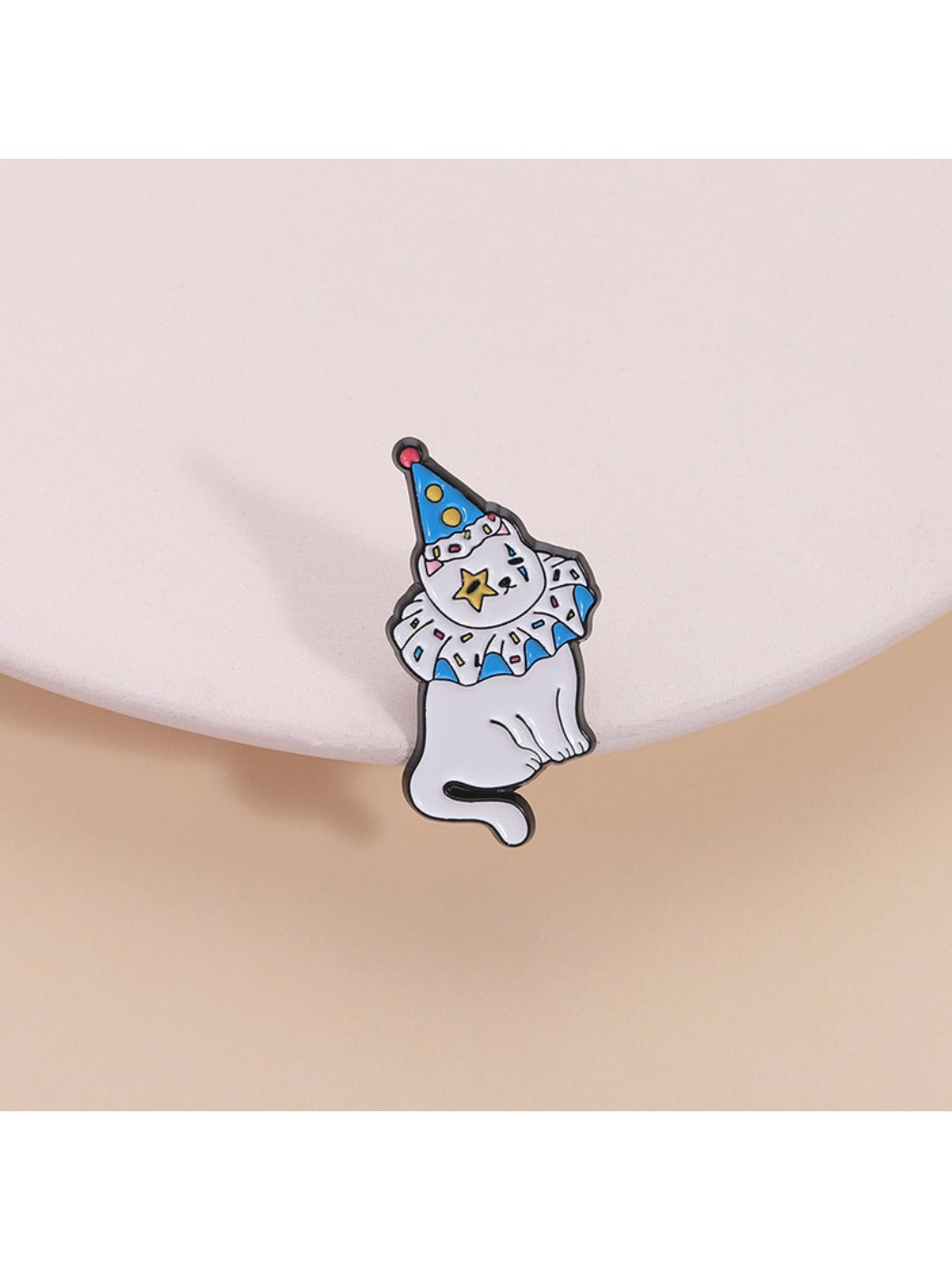 Pinori adorable clown cat brooch with colorful hat and bow tie on white background