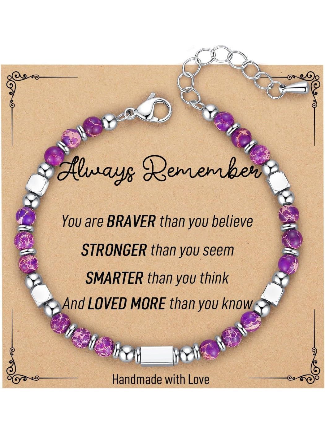 Emora bracelet coiled beside a bohemian style greeting card