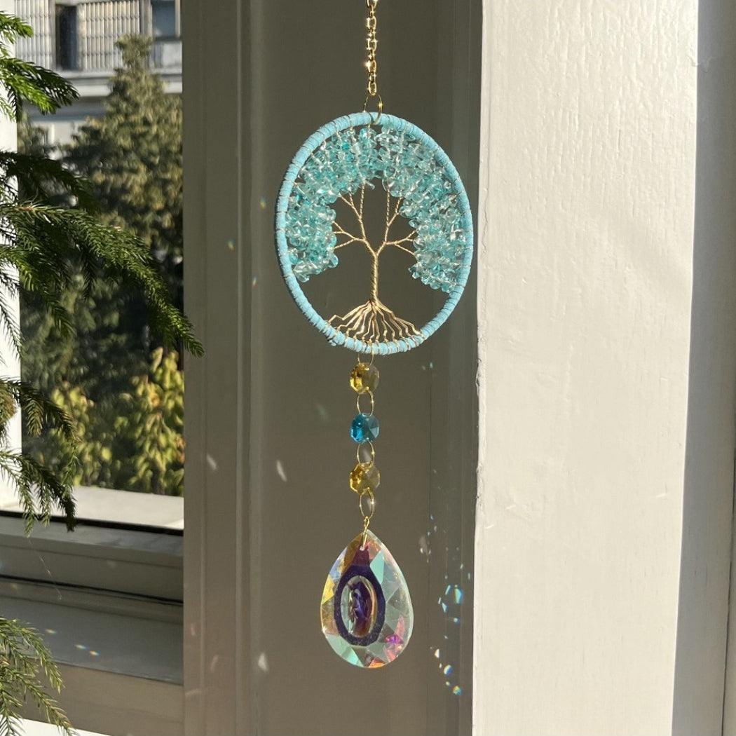 Somnira Tree of Life Dreamcatcher Suncatcher with natural light casting shadows