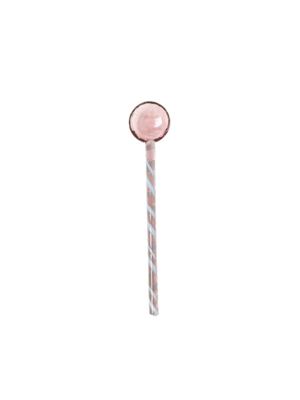 Thimara transparent glass spoon with colorful accents placed on a light background