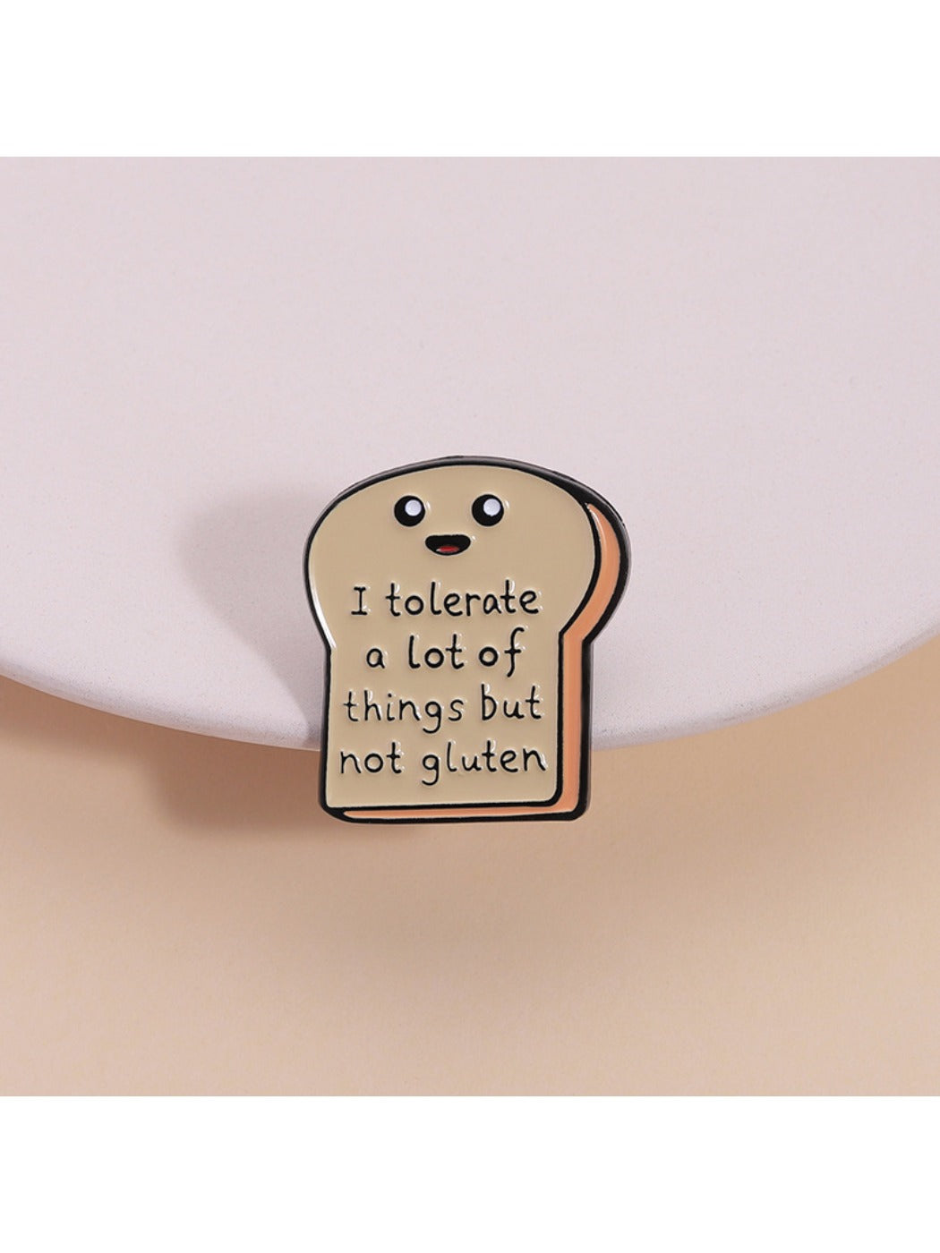 Pinori cute bread cartoon pin on a white background