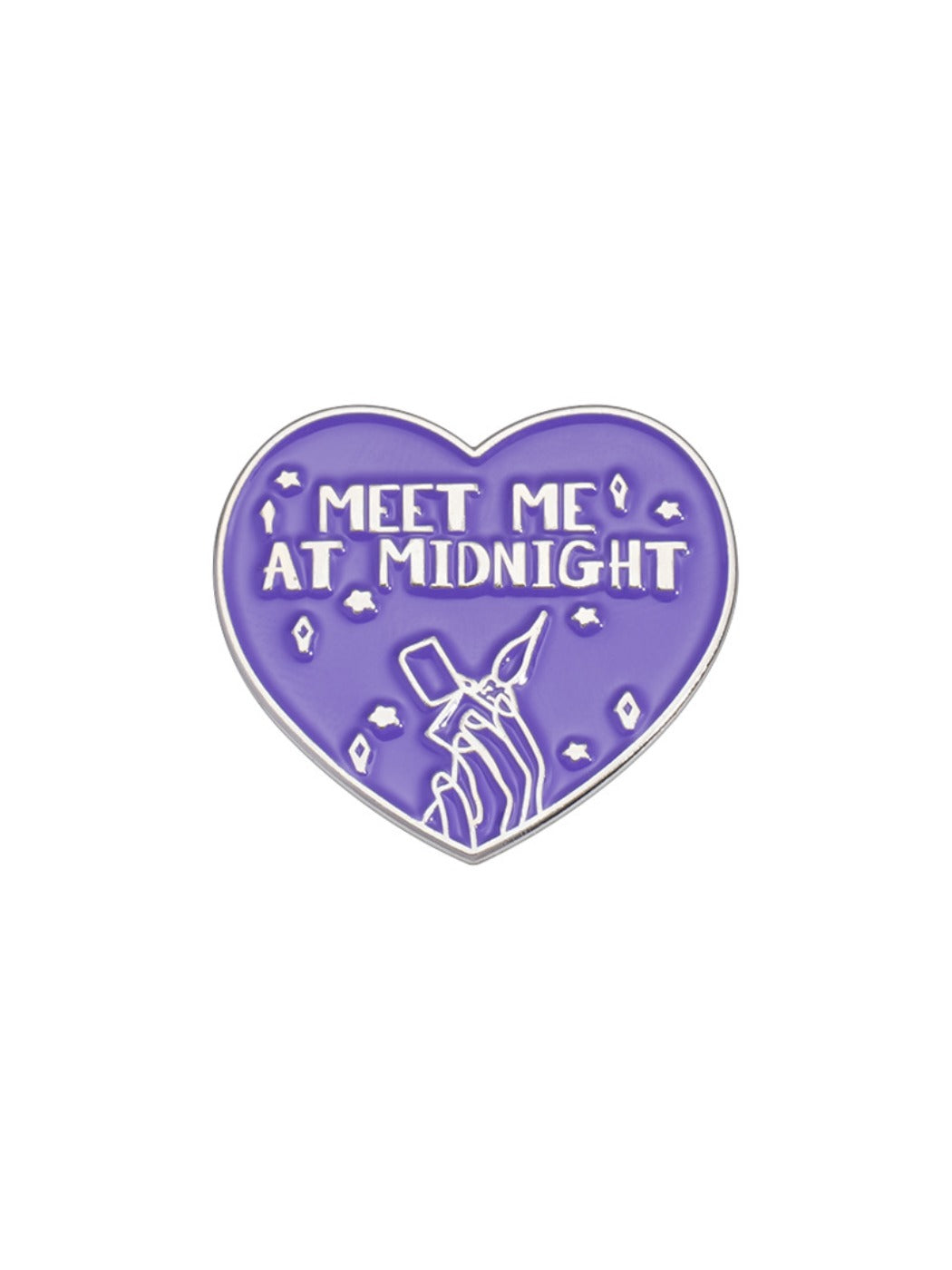 Pinori black heart badge photographed with soft lighting highlighting design