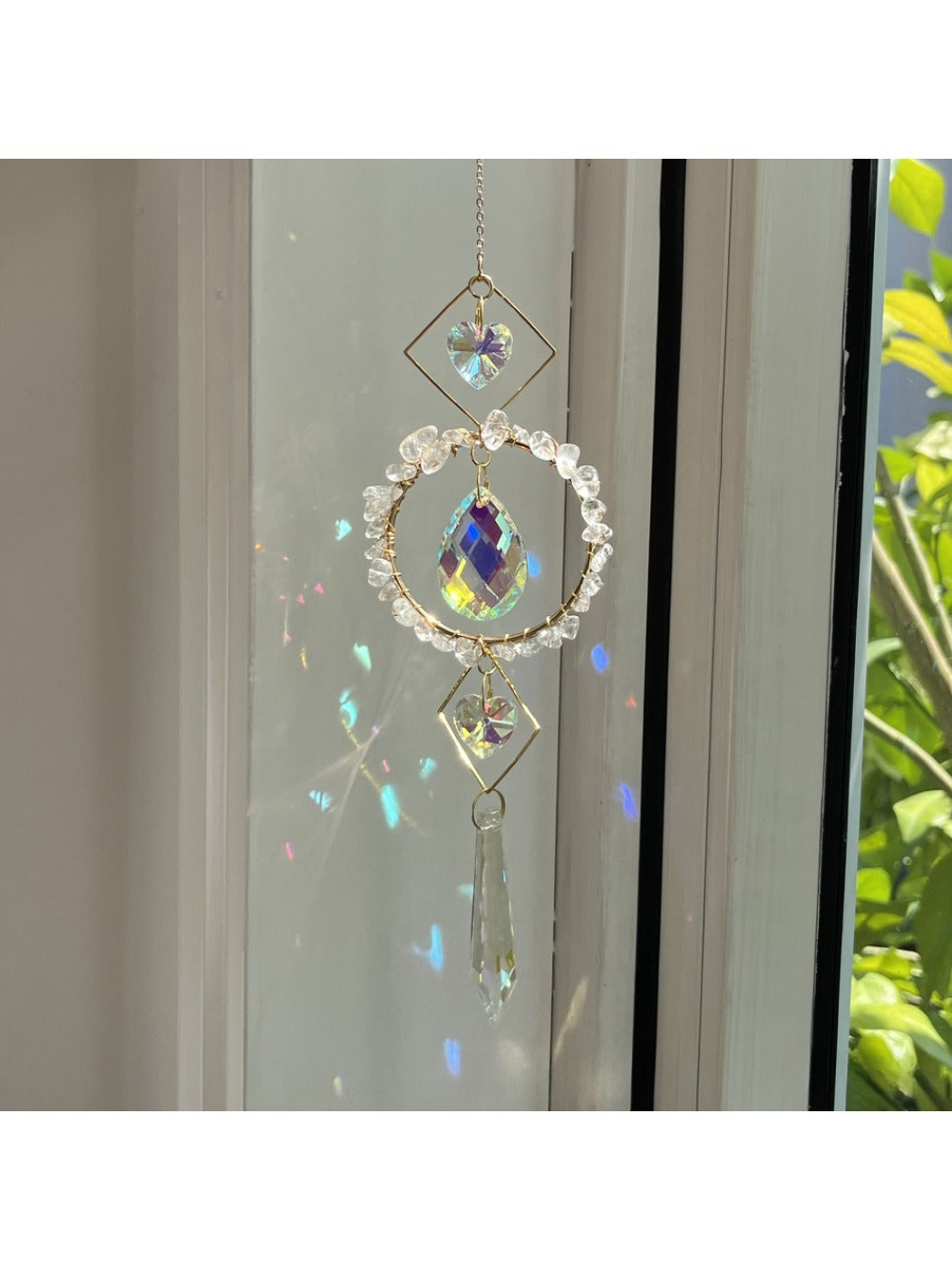 Close-up of Somnira wind chime showing multicolored glass elements and metal tubes