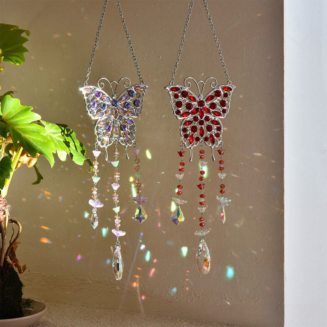 Close-up of Somnira butterfly suncatcher showing detailed stained glass design
