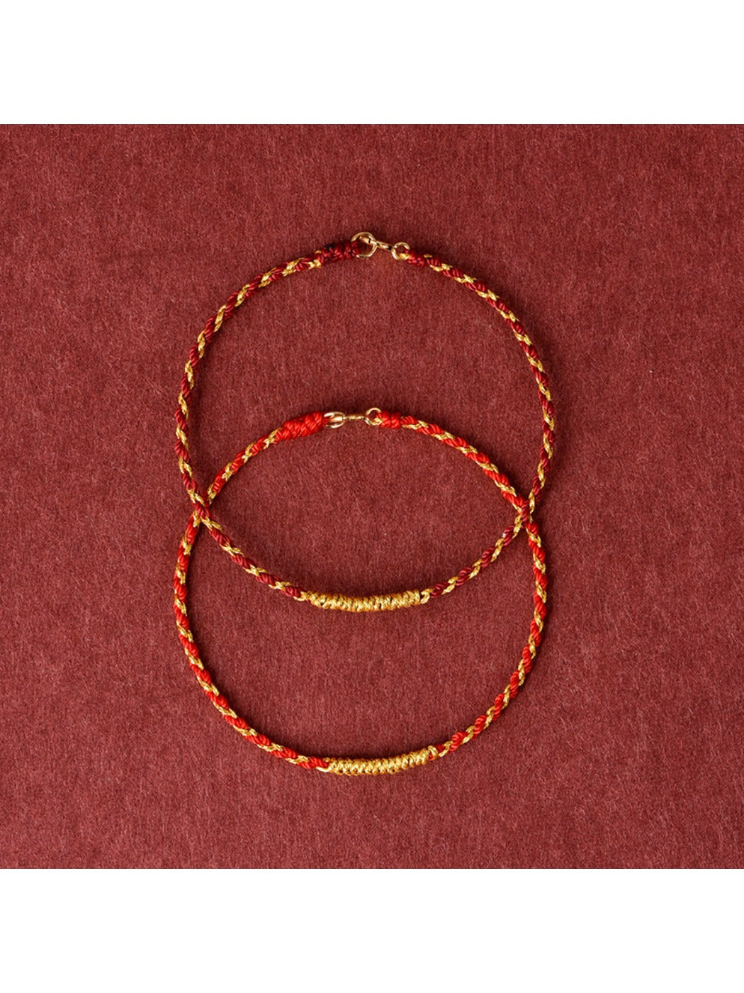 Emora Vajra Knot Rope Bracelet with golden thread on a white background