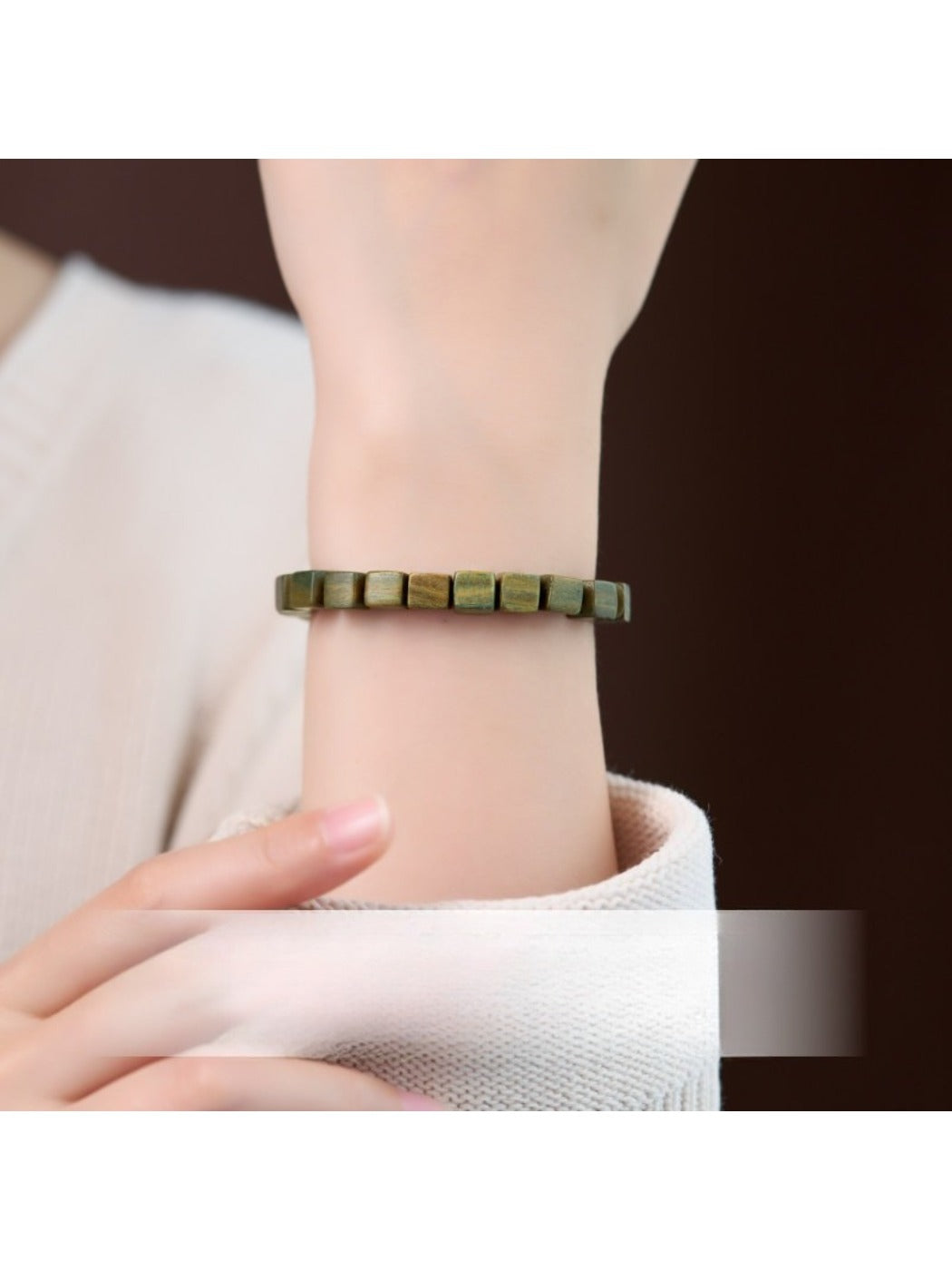 Emora square green beaded bracelet worn on wrist