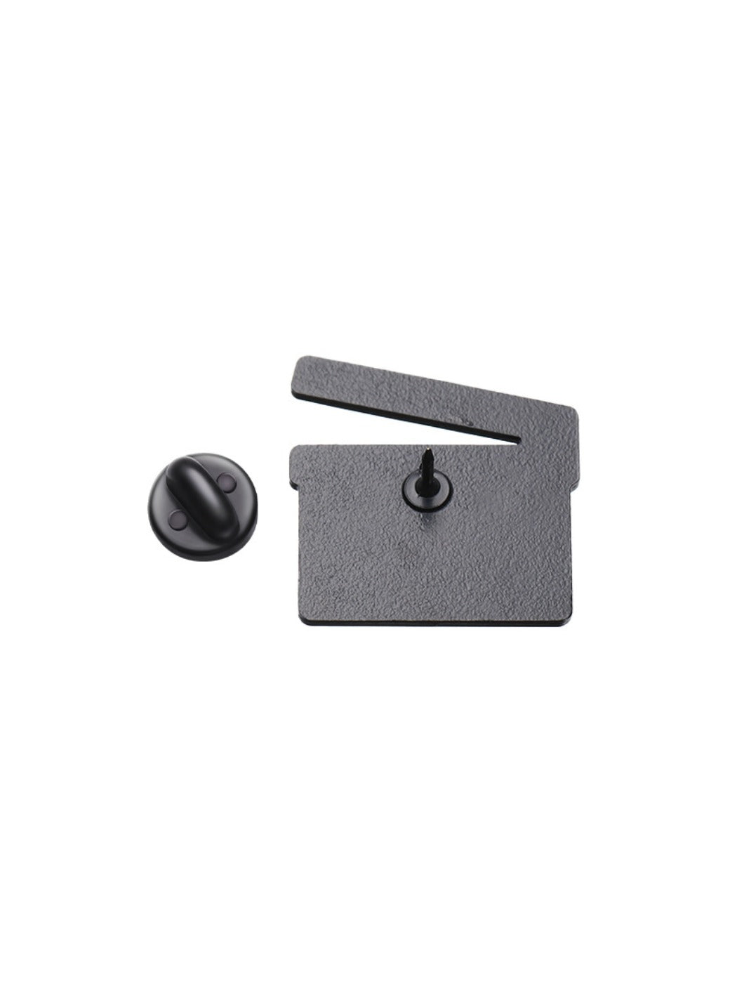 Pinori TV series clapperboard brooch angled to show clasp mechanism