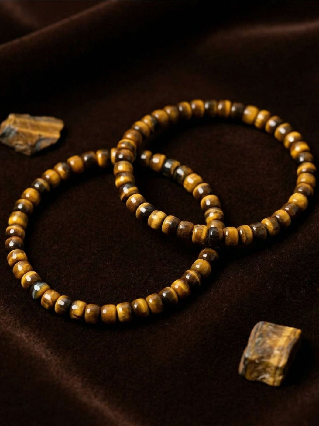 Emora bracelet worn on wrist, showcasing natural brown and gold tiger eye beads