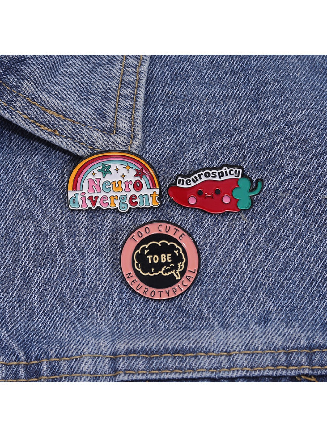 Close-up of colorful chili pepper brooch pin with smiling face