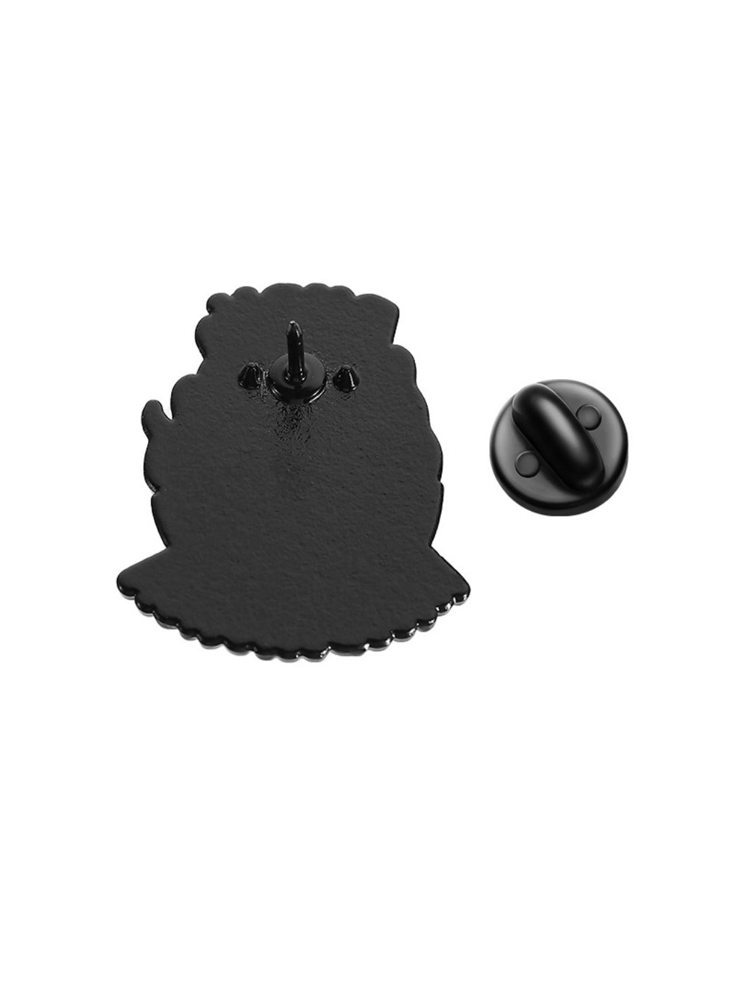 Pinori black cat flame badge photographed with soft lighting