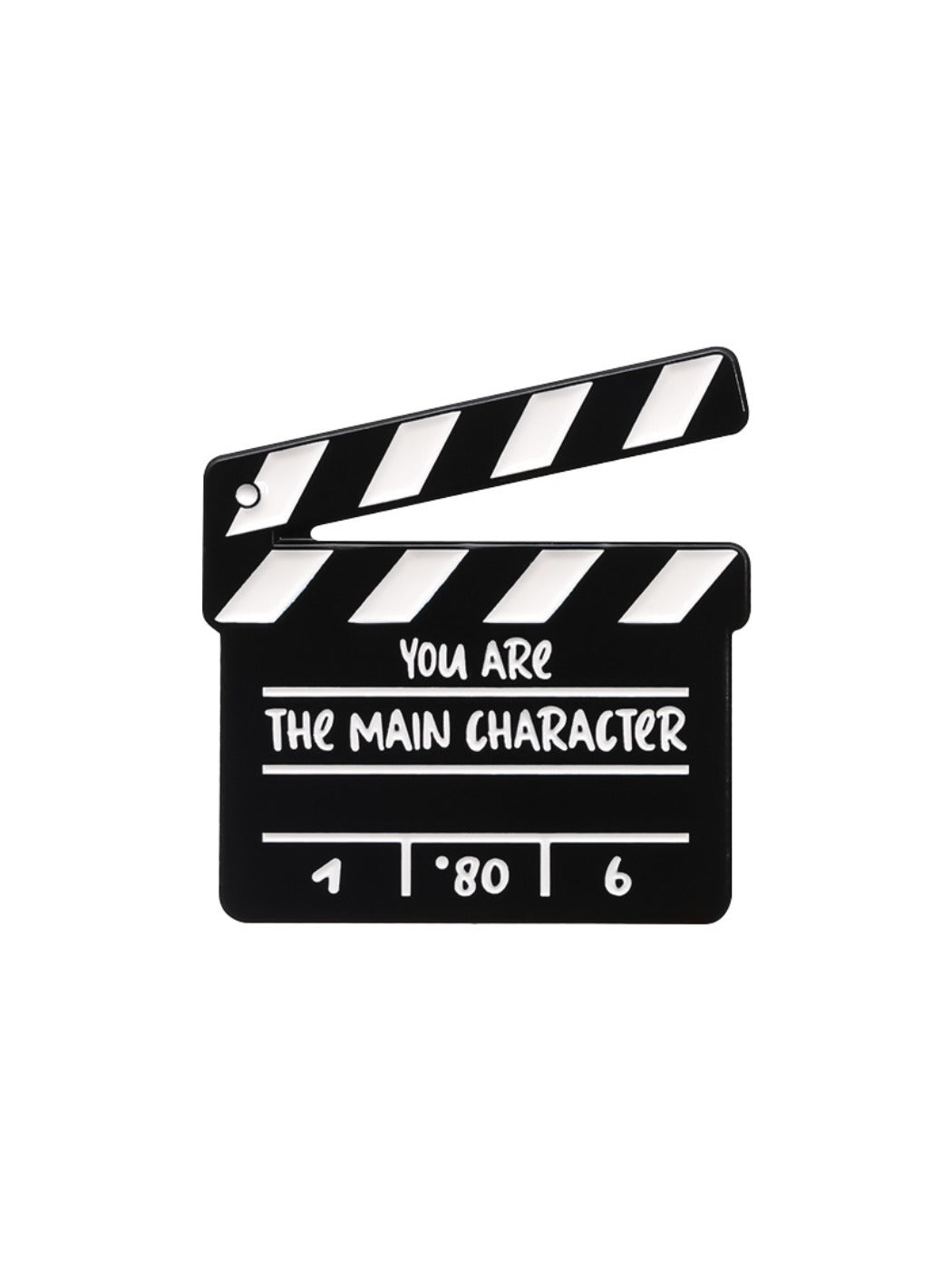 Pinori funny TV series clapperboard brooch displayed with other pins