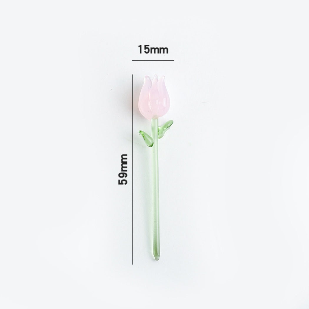 Top-down view of a tiny glass rose highlighting the intricate petal design