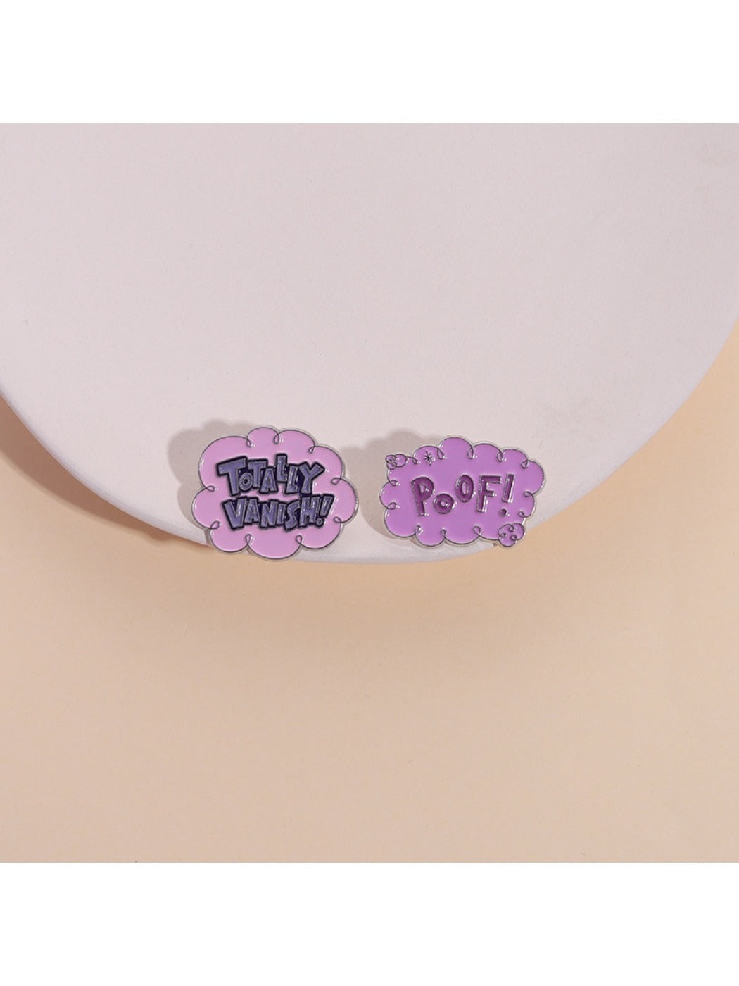 Close-up of Pinori Creative Pink Cloud metal pin on white background