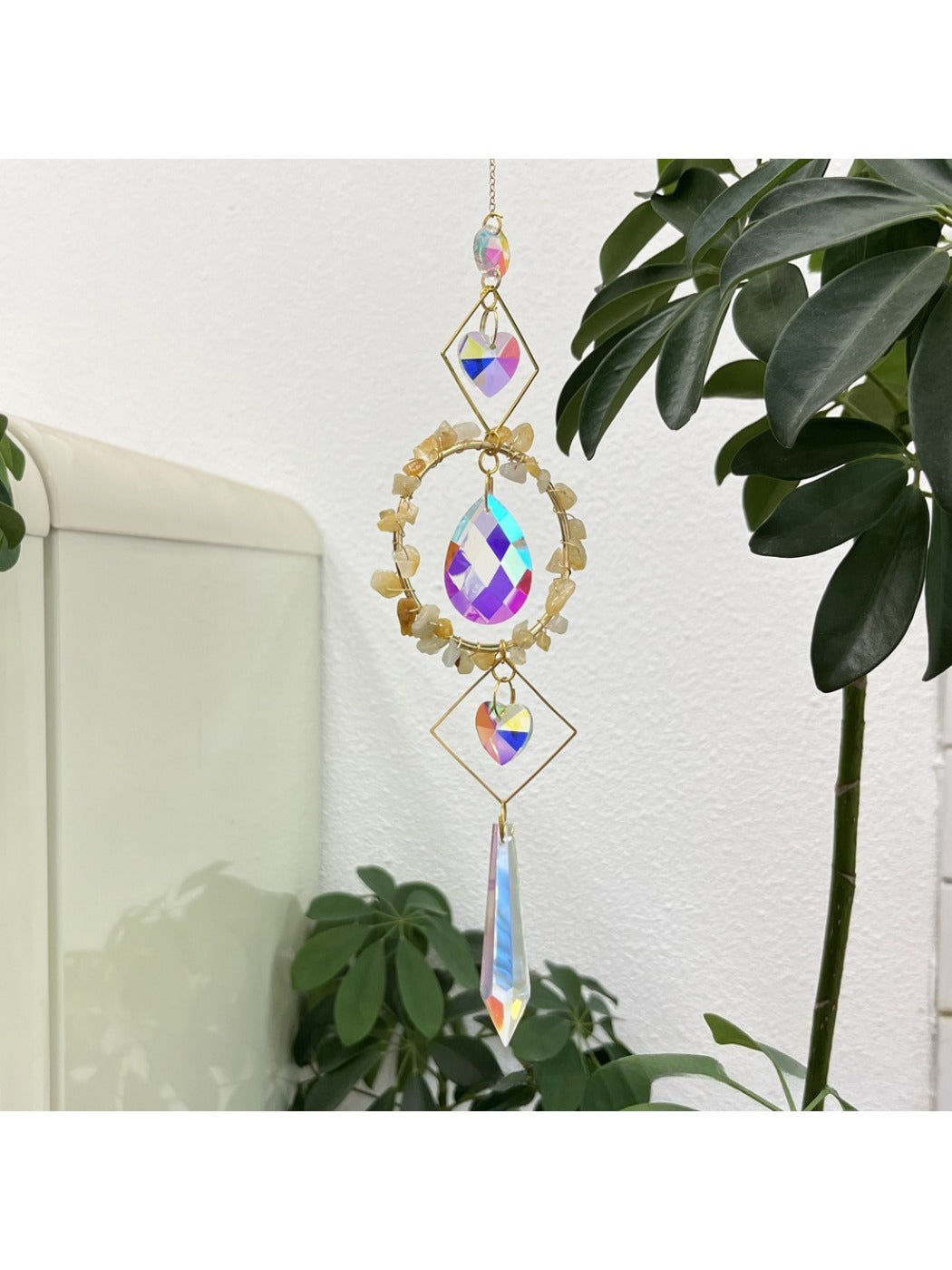 Detailed view of colorful glass pieces on Somnira suncatcher wind chime