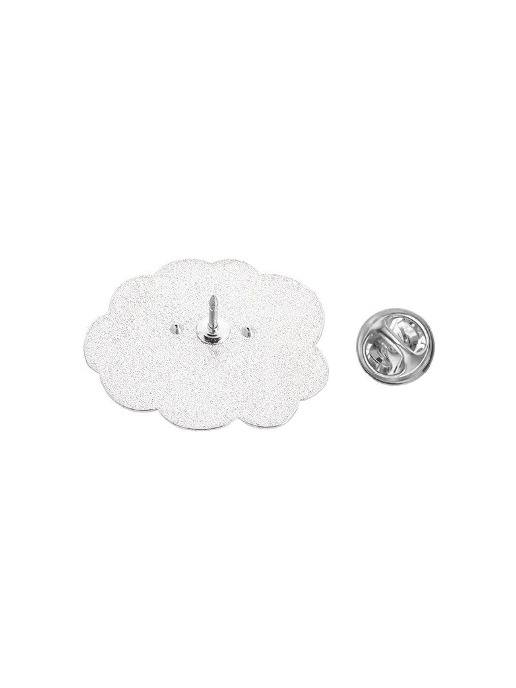 Creative pink cloud metal pin displayed on a corkboard with other pins